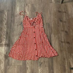 Rust tie front dress with white polka dots